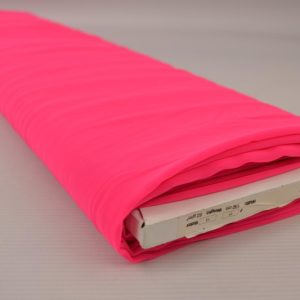 Neon roze chiffon stof op rol