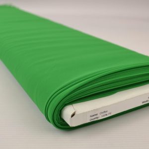 Groene chiffon stof op rol