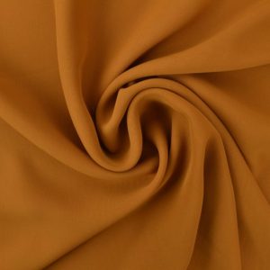 Chiffon stof donker okergeel