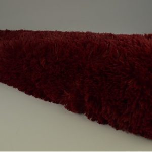 Bordeaux rood langharig bont stof op rol